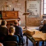 Lesung mit Musik: Historische Skurrilitäten aus Rudolfsheim‑Fünfhaus im VIBRIA