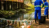 Porto Velho instala primeira ecobarreira em igarapé Belmont para conter resíduos urbanos