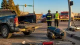 Pedestrian hurt by flying air compressor after two-vehicle crash in Medicine Hat