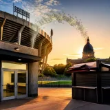 States redirect public dollars to college athletics as costs and athlete pay climb