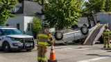 Woodstock police squad damaged after crash leaves other vehicle overturned