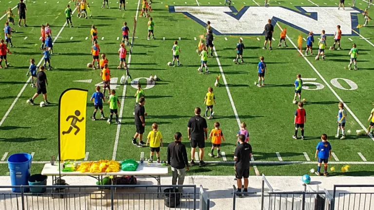 Nearly 70 kids take the field at Blue Bombers–KidSport skills camp in Winnipeg