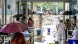 Dhanbad hospital wards waterlogged, ceilings leak as patients use umbrellas indoors