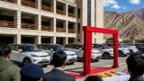 Leh gets first three-tier stacked parking; LG disburses EV subsidies, flags off rally