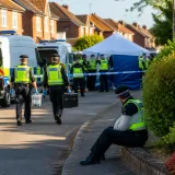 Metropolitan Police arrest 17 after large-scale dawn raids in organised crime inquiry