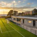 £1.98m all‑weather pitch and pavilion opens at Ysgol y Creuddyn to boost community sport