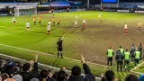 Mansfield hold Huddersfield to goalless draw as hosts finish with 10 men