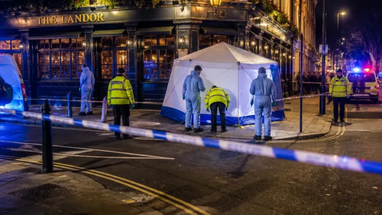 Murder probe after 25-year-old shot dead outside Clapham pub; 22-year-old arrested
