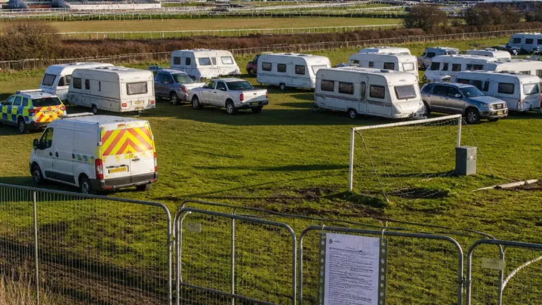 Redcar caravans moved from football pitch to field near racecourse after court order