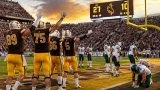 Cowboys capitalize on miscues, beat Hawaii 27-10 at War Memorial Stadium