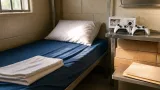 Delaware inmate drops $100,000 suit; settles for Xbox, controllers and bottom bunk