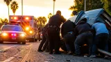 Los Angeles officers, bystanders lift car in bodycam rescue after July crash