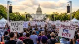 Thousands rally on National Mall urging action after Supreme Court decision on voting rights