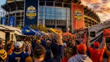 West Virginia heads to Charlotte to face No. 25 Virginia in Duke’s Mayo Classic
