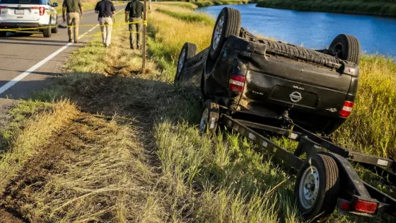 Woman killed after vehicle pulling boat fishtails and rolls on Rendezvous Road